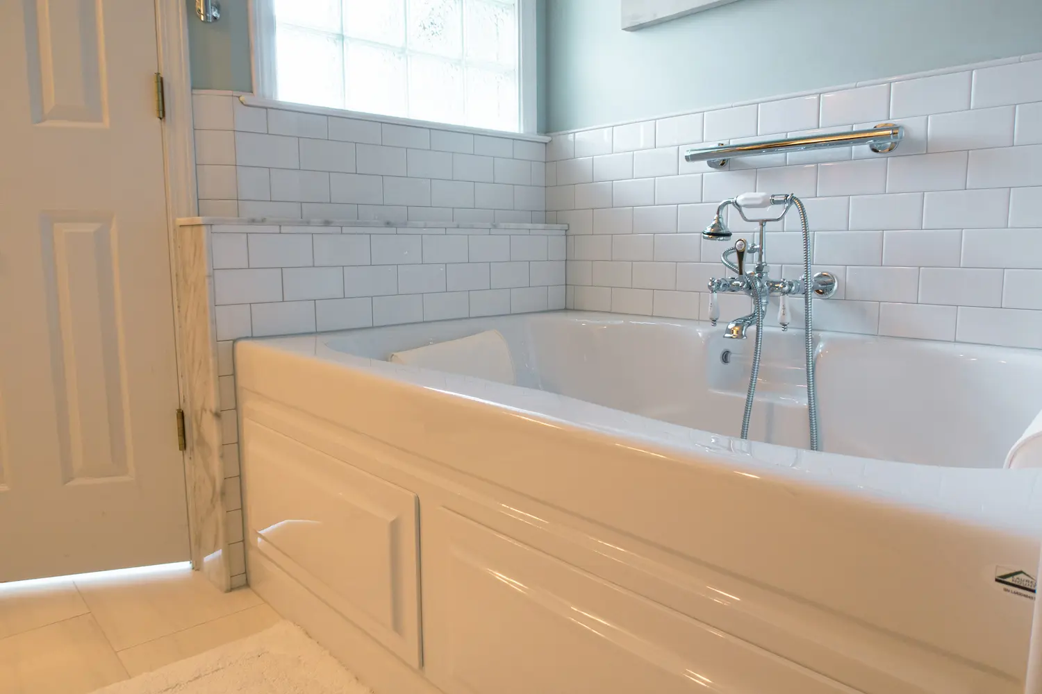 Charlotte bathroom remodel with tiled walls and modern fixtures