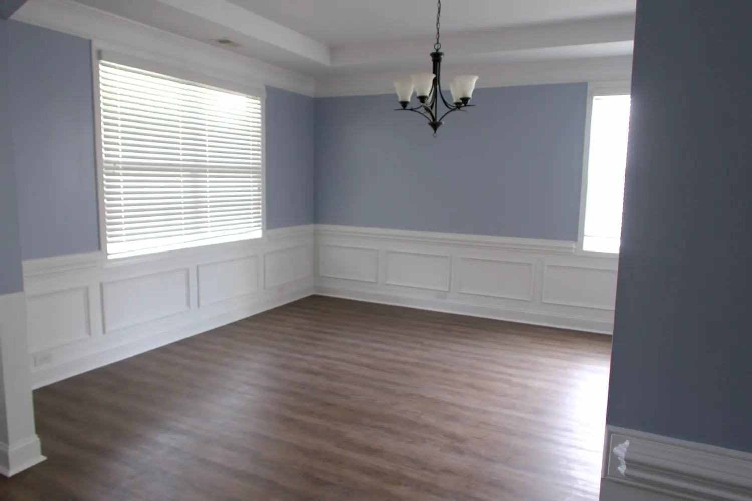 Huntersville dining room with new wood-look plank flooring